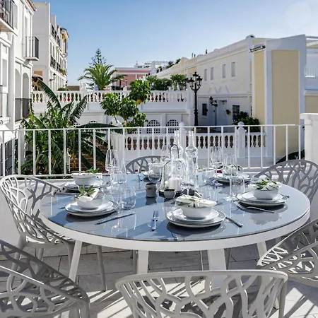 Holiday home Stunning 2 Bedroom Townhouse With Serene Terrace And Charming Mountain Views *
